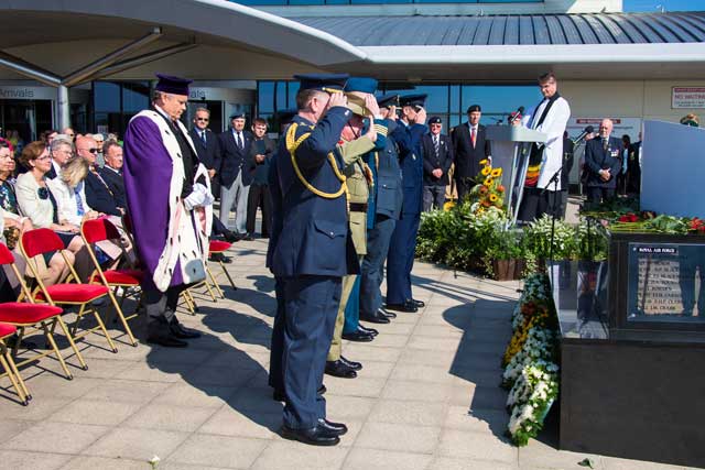 The six air attaches of the RAF, RCAF, RAAF, RNAF, USA and Czech Republic laying their wreaths after the Bailiff salute the memorial.